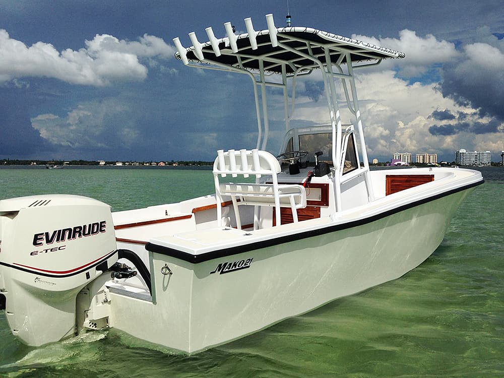 Restored center console, mirror-gloss white hull, out on the water
